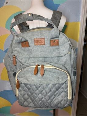 Sunshine Diaper Bag Gray Quilted with Leather Accents fold out into bed